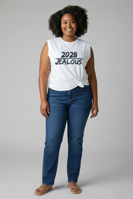 Woman wearing a white sleeveless muscle t-shirt with 2028 JEALOUS design and blue jeans