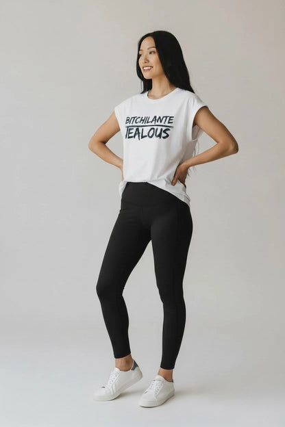 Model wearing Jealous Tee women's rights muscle tee with BITCHILANTE JEALOUS design