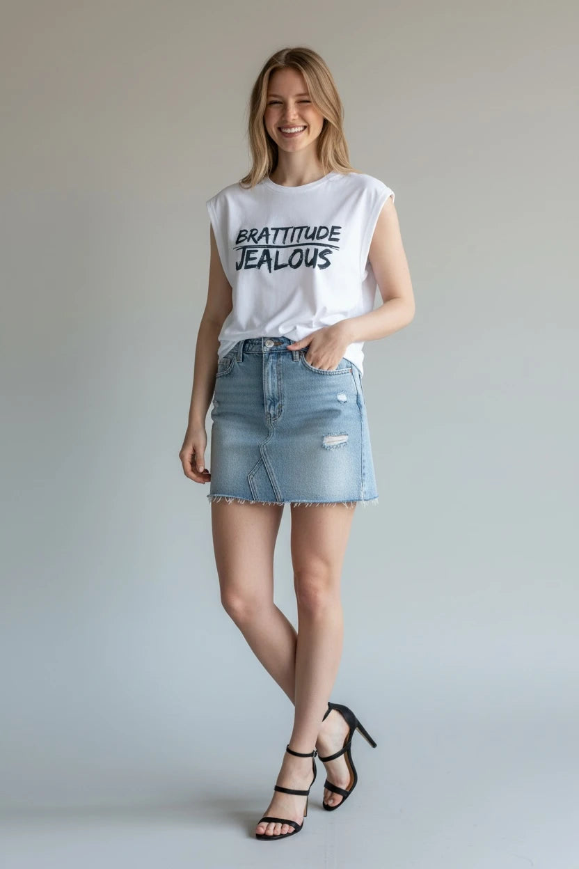 Model wearing Jealous Tee feminist empowerment muscle tee with BRATTITUDE JEALOUS design
