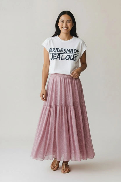 Woman wearing a BRIDESMADE JEALOUS feminist empowerment muscle tee