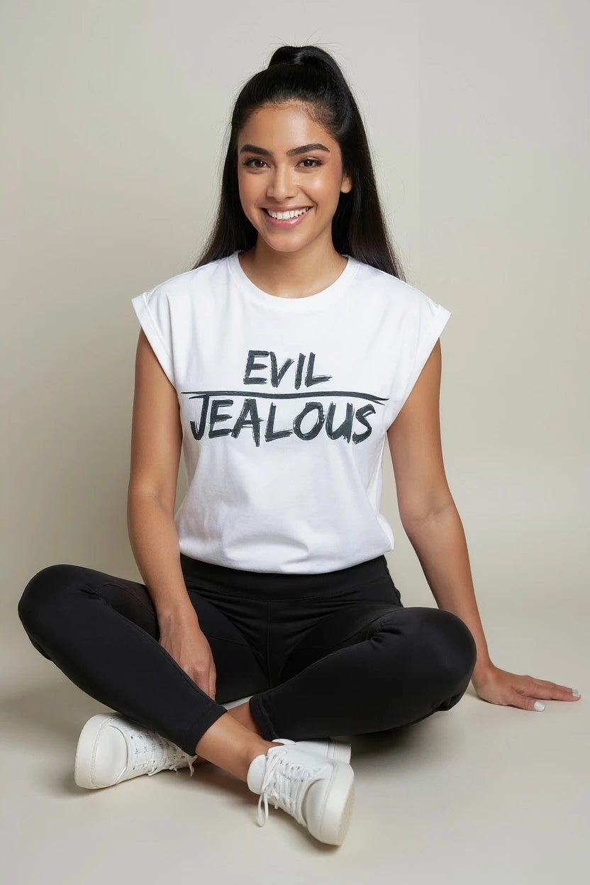 Cross-legged model in white muscle t-shirt with EVIL JEALOUS design