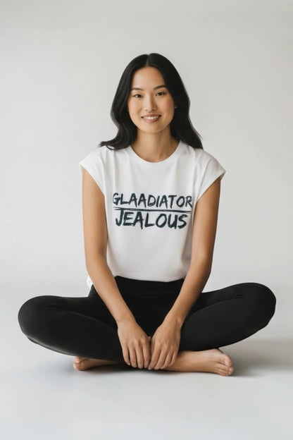 Model wearing Jealous Tee equality muscle t-shirt with GLAADIATOR JEALOUS graphic