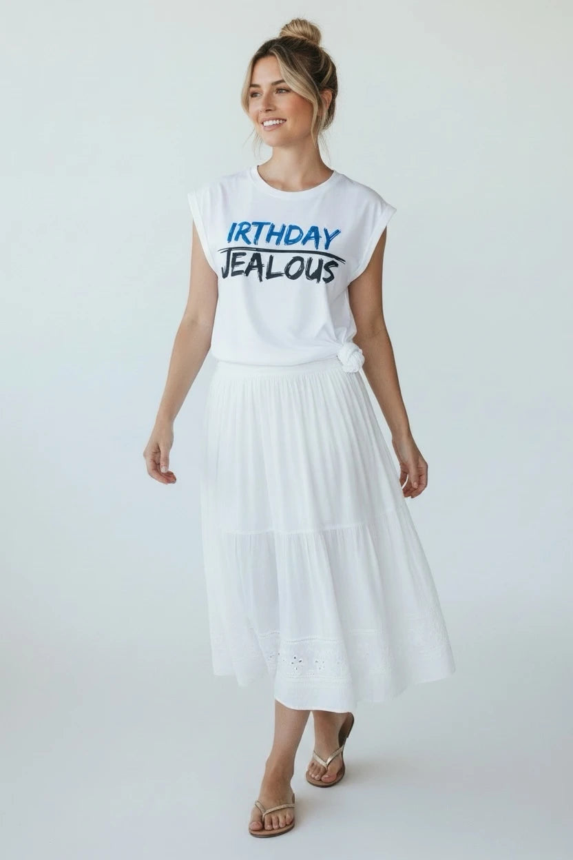 Model wearing Jealous Tee earthday and birthday muscle tee with IRTHDAY JEALOUS design 