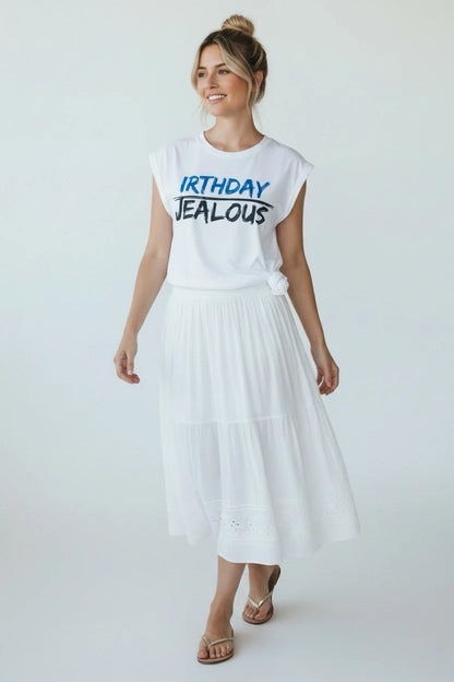 Model wearing Jealous Tee earthday and birthday muscle tee with IRTHDAY JEALOUS design 