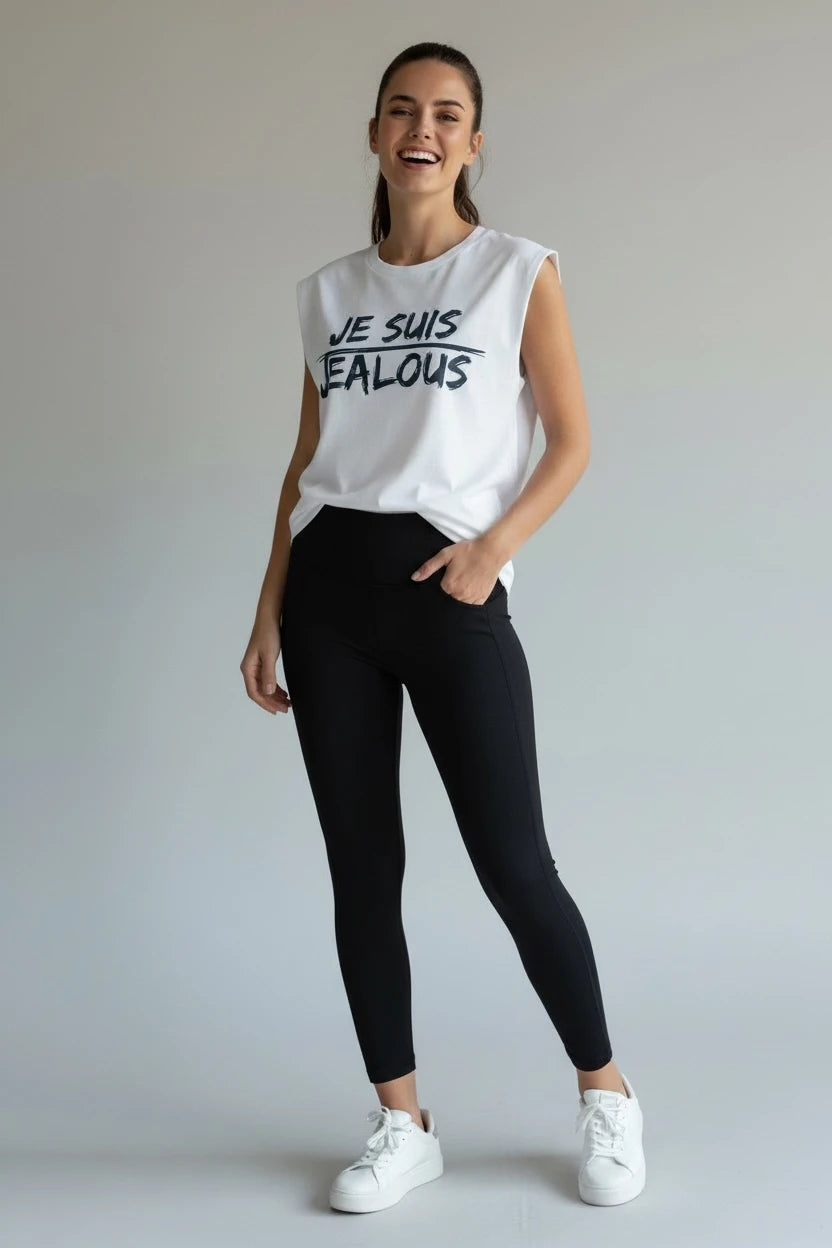 Woman wearing progressive women's rights sleeveless JE SUIS t-shirt and black leggings