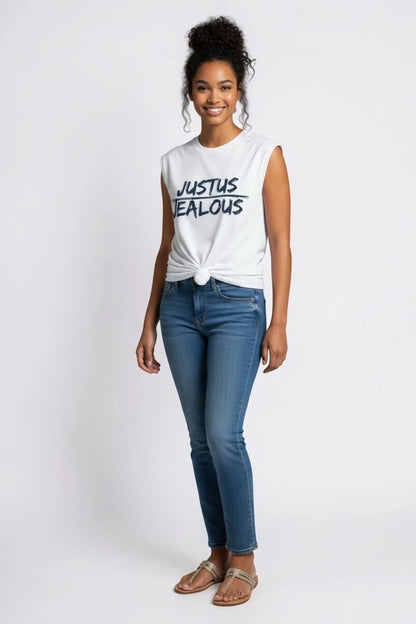 Jealous Tee equality and human rights muscle t-shirt with JUSUTS JEALOUS design wearing jeans