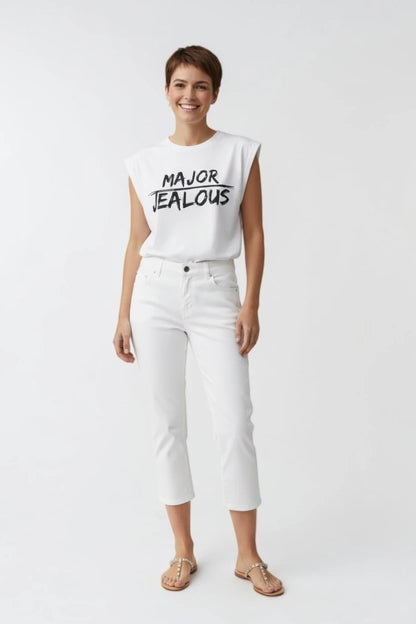 Woman wearing MAJOR JEALOUS progressive muscle tee and white jeans