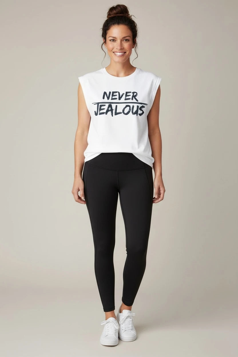NEVER JEALOUS progressive empowerment white muscle tee with black leggings