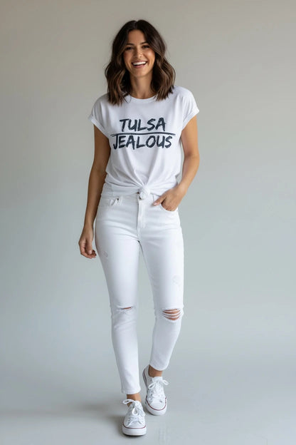 Jealous Tee Tulsa feminist muscle tee by JealousTee with white denim jeans