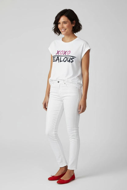 Model wearing Jealous Tee XOXO progressive women's empowerment muscle tee